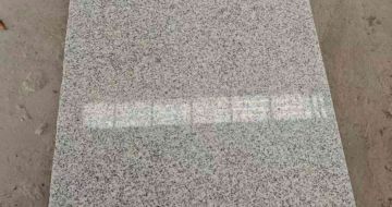 鞍山芝麻白光面毛板